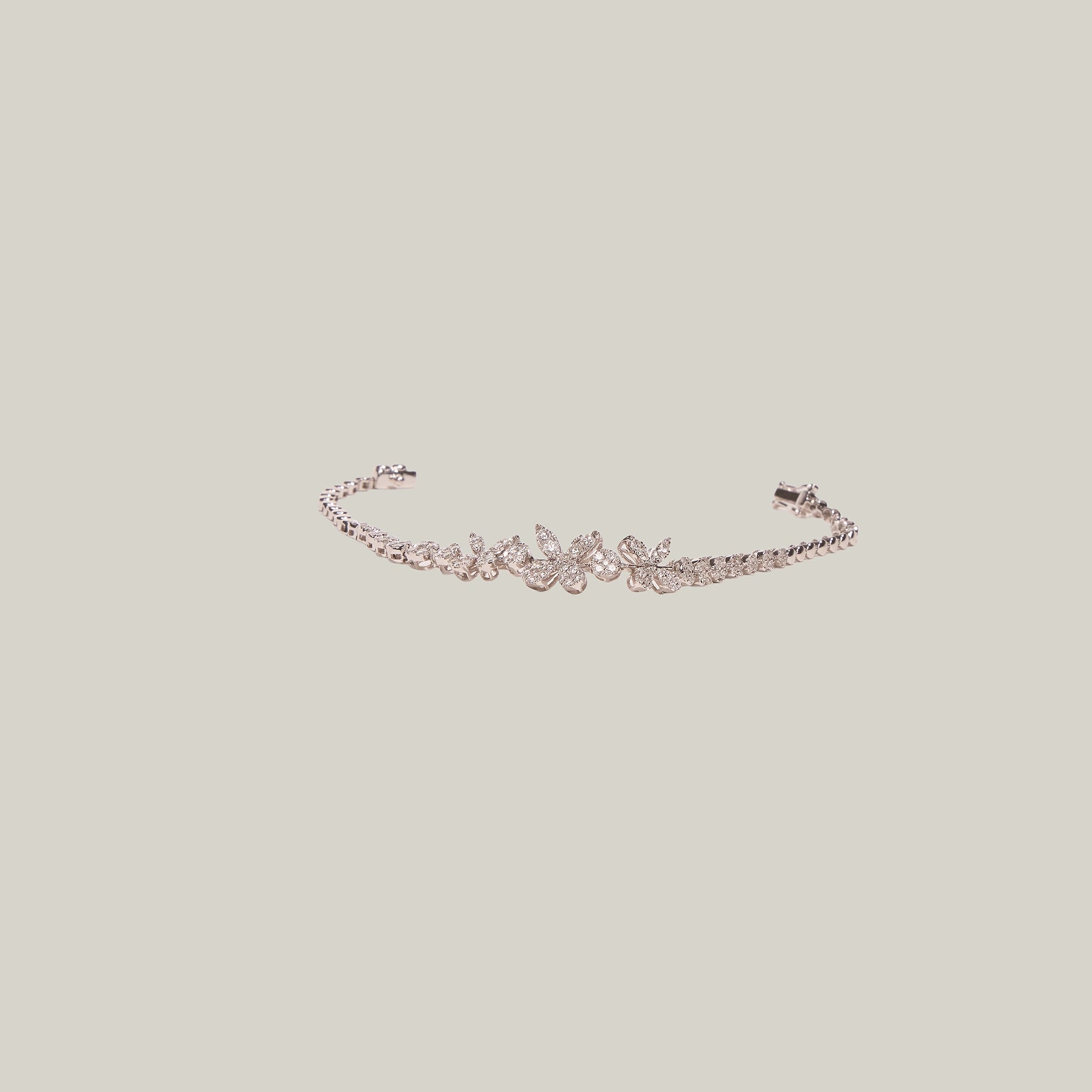 Floral diamond bracelet on a light gray background